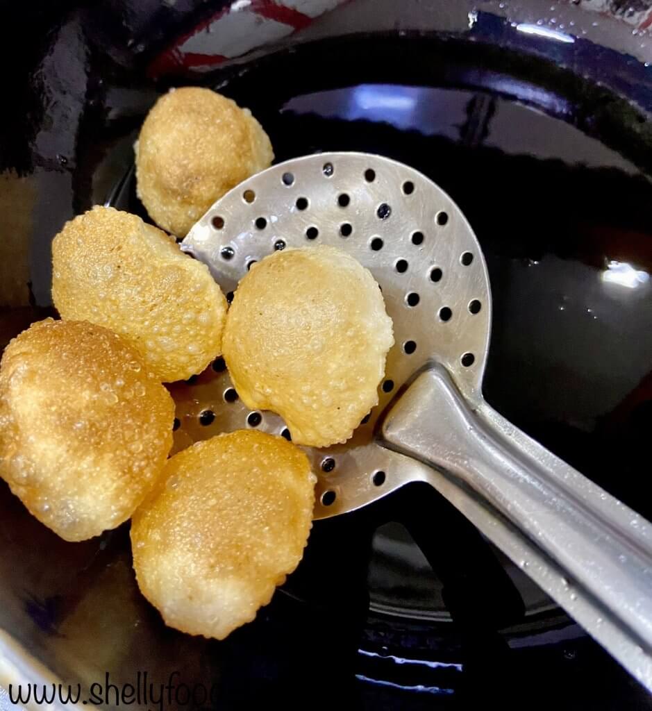Fried golgappa from oil popular Indian street food recipe.